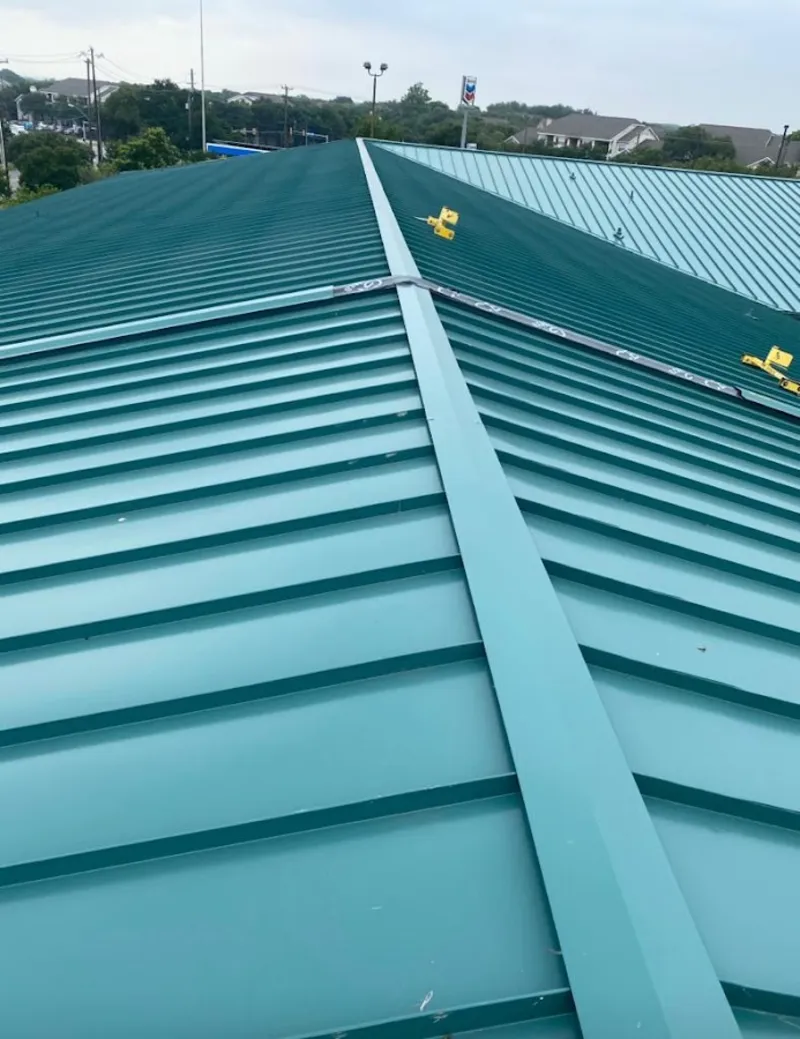 Green commercial metal roof ridge and valley for Metal Roof Repair in Sandy Oaks